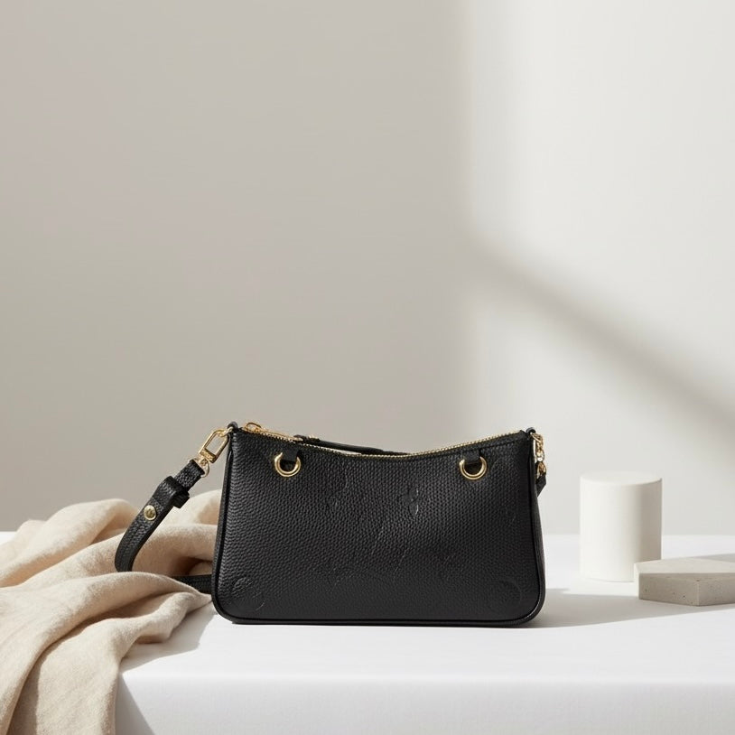 The Embossed Pochette Designer Bag