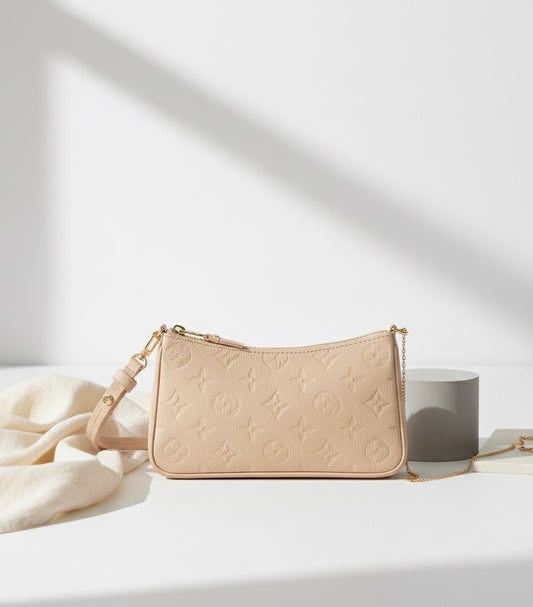The Embossed Pochette Designer Bag